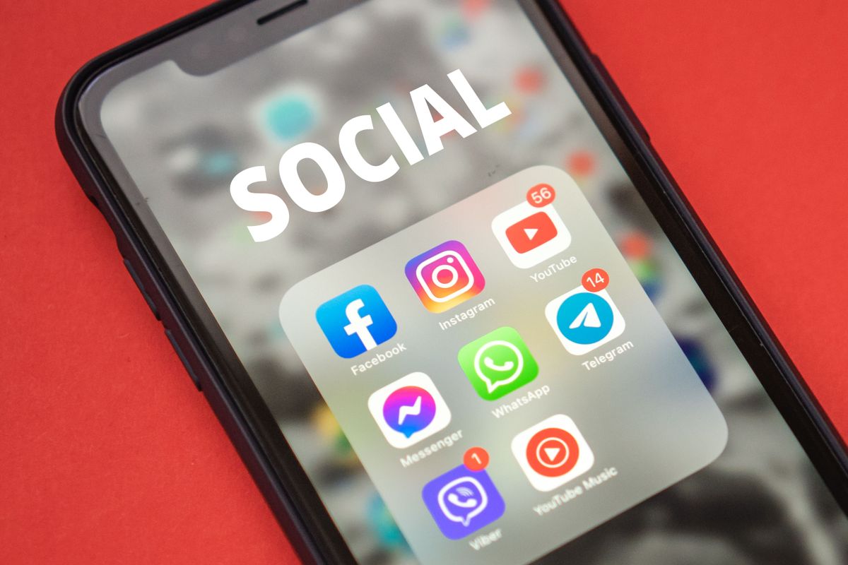 Smartphone screen showing mobile app icons for business use
